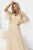 654-2-dluga-polyskujaca-sukienka-plus-size-z-dekoltem-i-transparentnym-rekawkiem-szampanski-be_20588.jpg