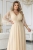 654-2-dluga-polyskujaca-sukienka-plus-size-z-dekoltem-i-transparentnym-rekawkiem-szampanski-be_20595.jpg